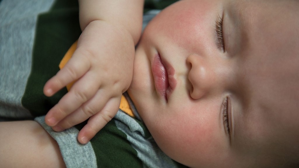 Baby moving in clearance sleep